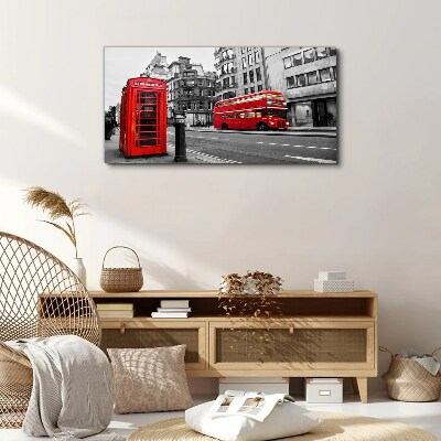 Red telephone in a grey city Canvas wall art