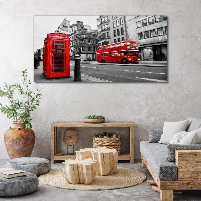 Red telephone in a grey city Canvas wall art