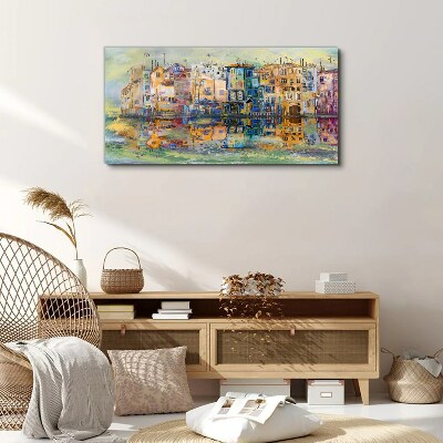 A colorful town by the water Print on canvas