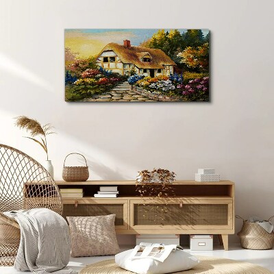 A charming country cottage in flowers Canvas wall art