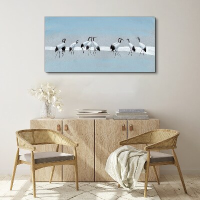 Flocks of cranes on a blue background Print on canvas