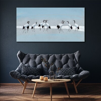 Flocks of cranes on a blue background Print on canvas