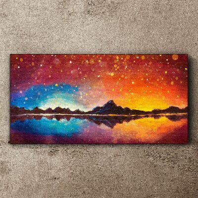 Sunset over a mountain lake Canvas wall art