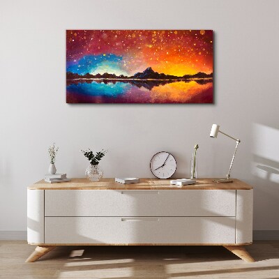 Sunset over a mountain lake Canvas wall art