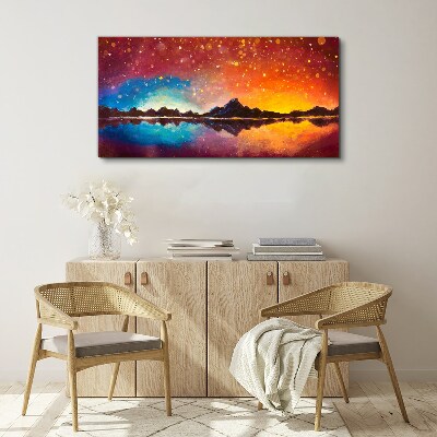 Sunset over a mountain lake Canvas wall art