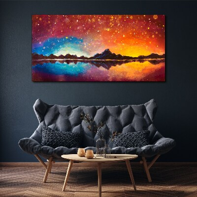 Sunset over a mountain lake Canvas wall art