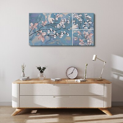 Floral branches on a blue background Print on canvas