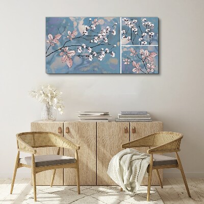 Floral branches on a blue background Print on canvas