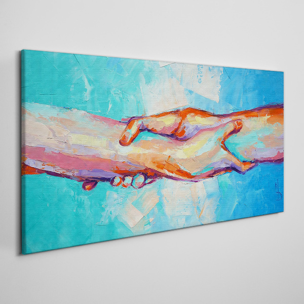 Uniting hands in color Canvas wall art