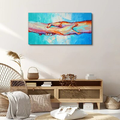Uniting hands in color Canvas wall art
