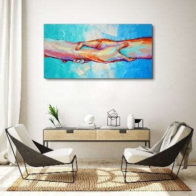 Uniting hands in color Canvas wall art