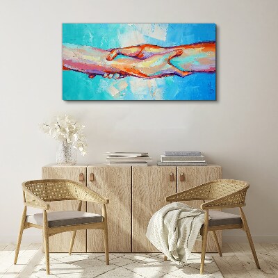 Uniting hands in color Canvas wall art