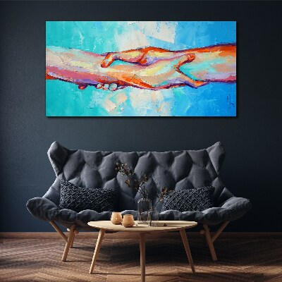 Uniting hands in color Canvas wall art