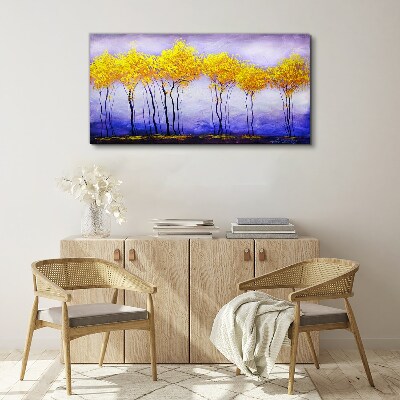 Golden trees in a purple landscape Canvas wall art