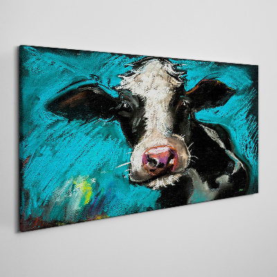 Portrait of a cow on a blue background Print on canvas