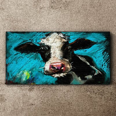 Portrait of a cow on a blue background Print on canvas