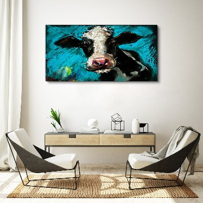 Portrait of a cow on a blue background Print on canvas