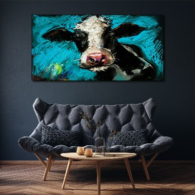 Portrait of a cow on a blue background Print on canvas