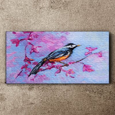 Spring bird on pink branches Canvas wall art