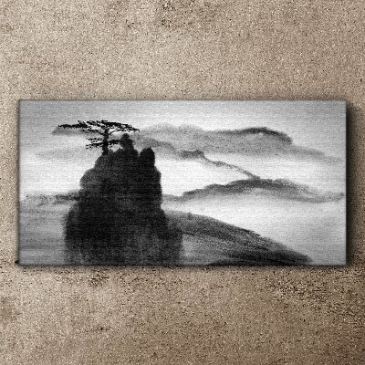 A lonely tree on a rocky mountain Print on canvas