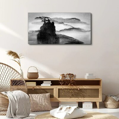 A lonely tree on a rocky mountain Print on canvas