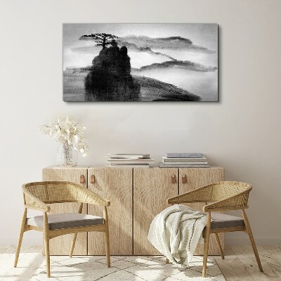 A lonely tree on a rocky mountain Print on canvas