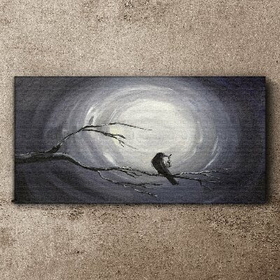 A lonely bird on a branch Canvas wall art