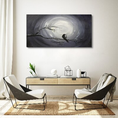 A lonely bird on a branch Canvas wall art