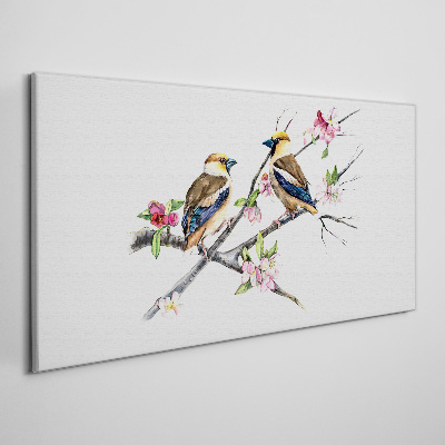 Birds on a branch among flowers Canvas wall art