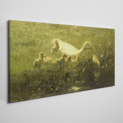 Duck with chicks in the grass Print on canvas