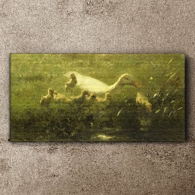 Duck with chicks in the grass Print on canvas