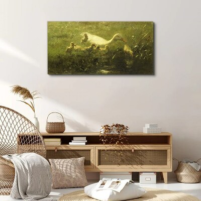 Duck with chicks in the grass Print on canvas