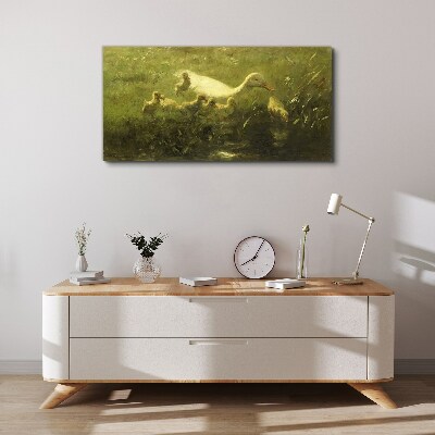 Duck with chicks in the grass Print on canvas