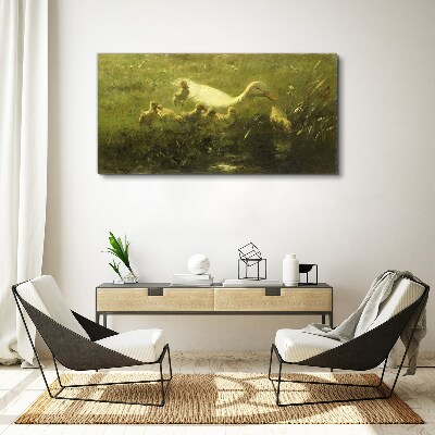 Duck with chicks in the grass Print on canvas
