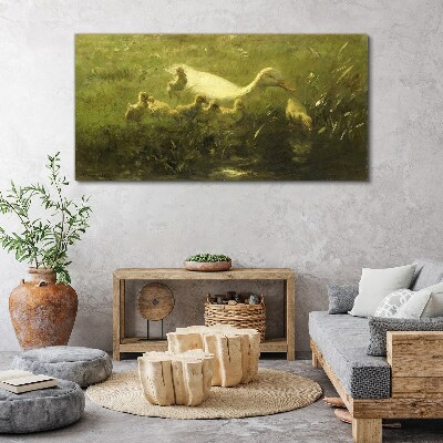 Duck with chicks in the grass Print on canvas