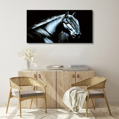 A dark horse in the glow of light Print on canvas