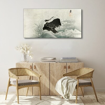 A bird on a rock in the waves Canvas wall art