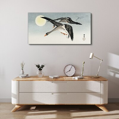 Geese in flight under the full moon Canvas wall art