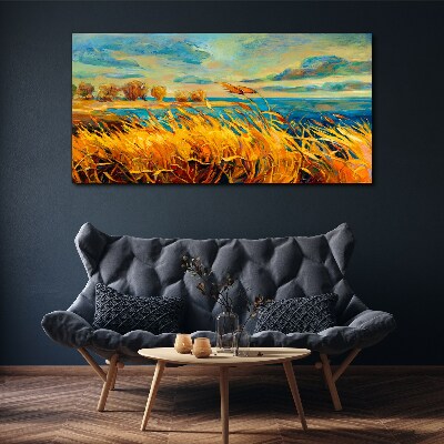 Golden grass over blue water Canvas wall art