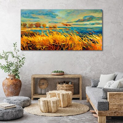 Golden grass over blue water Canvas wall art