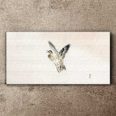 Bird's flight in delicate colors Canvas wall art