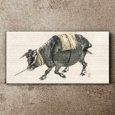 Horned cow on the move Canvas wall art