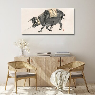 Horned cow on the move Canvas wall art