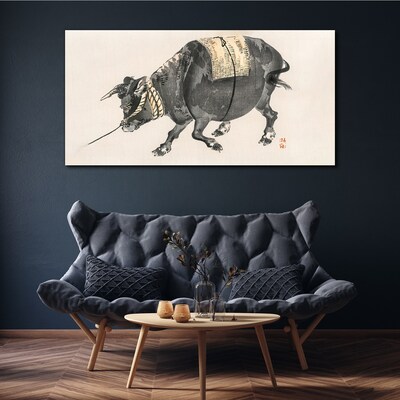 Horned cow on the move Canvas wall art