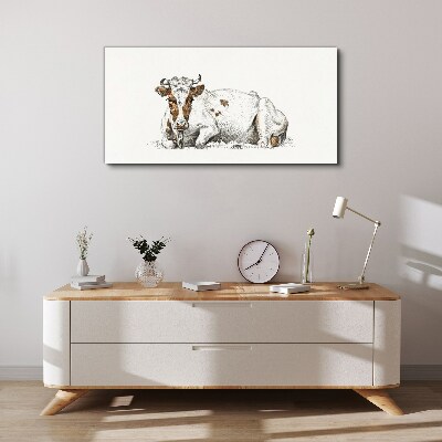 A calm cow in the meadow Print on canvas
