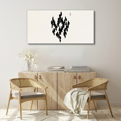 Black figures on a white background Canvas wall art
