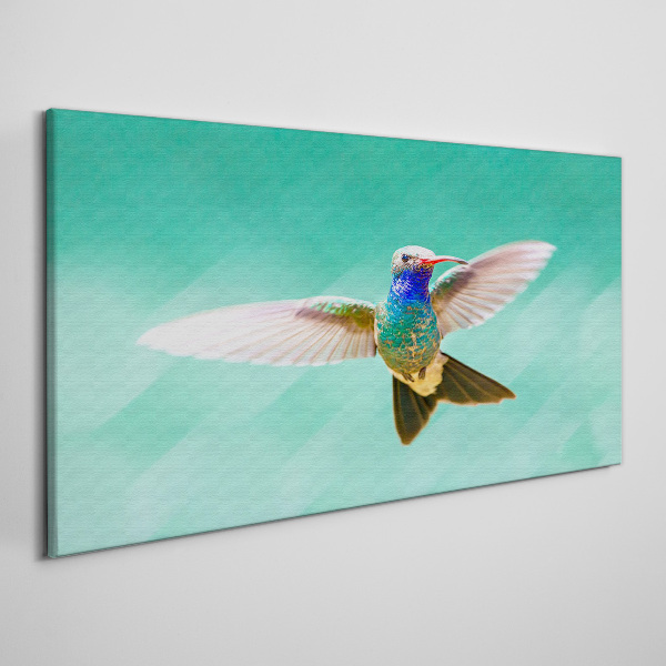 Hummingbird in blue background Canvas wall art