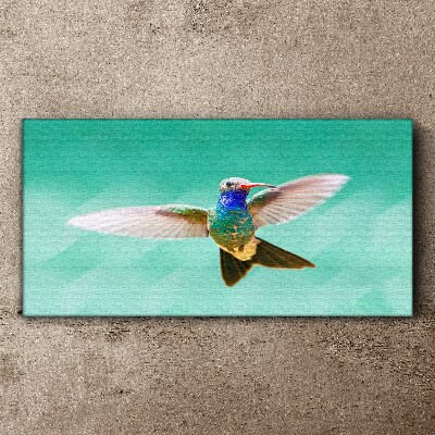 Hummingbird in blue background Canvas wall art