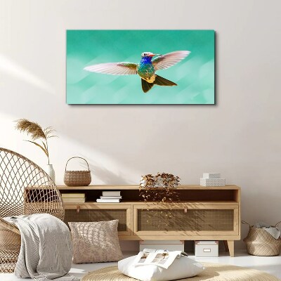 Hummingbird in blue background Canvas wall art