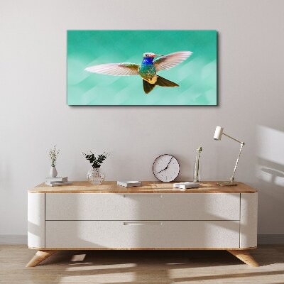 Hummingbird in blue background Canvas wall art